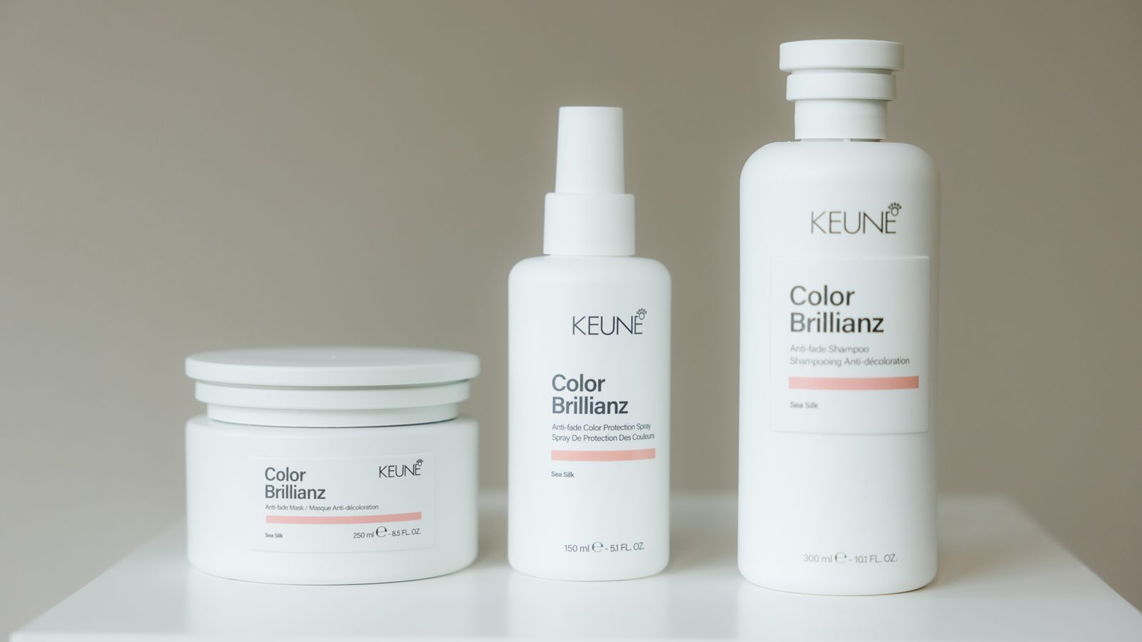 Drie producten uit de Keune Color Brillianz-lijn: masker, shampoo en spray