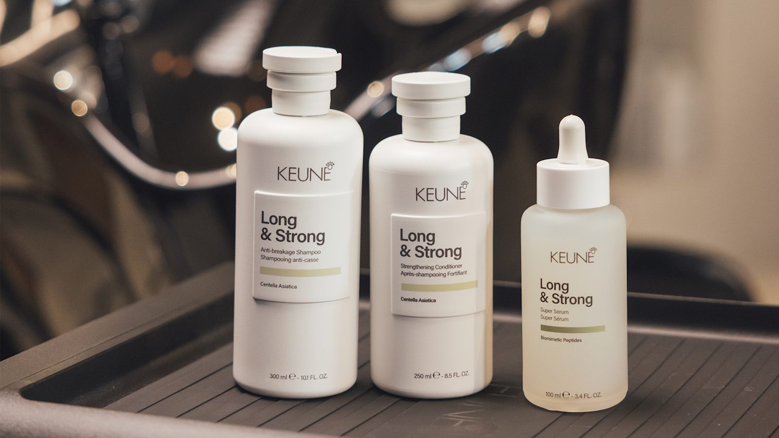 Keune Long & Strong shampoo, conditioner en serum naast elkaar
